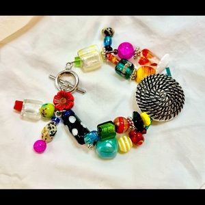 Whimsical super chunky bracelet to kick up that tee & shorts this summer!